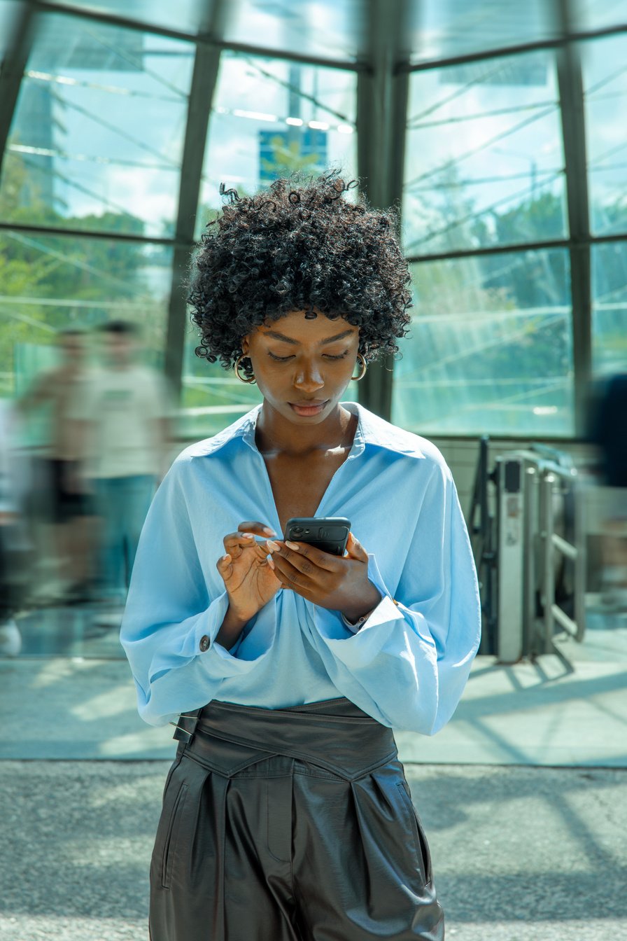 Woman Using a Smartphone Outdoors