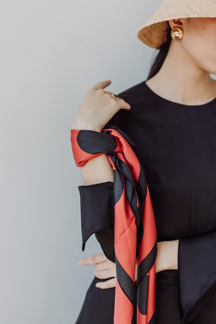 Woman with Scarf on Her Wrist